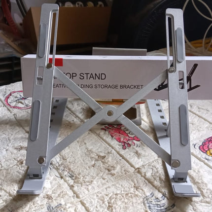Metal Portable Laptop Stand â€“ 6-Angle Adjustable Riser for Laptops, Phones & Tablets