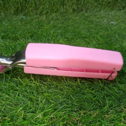 Kitchen tongs and bowl clips made of stainless steel, designed for handling hot items.