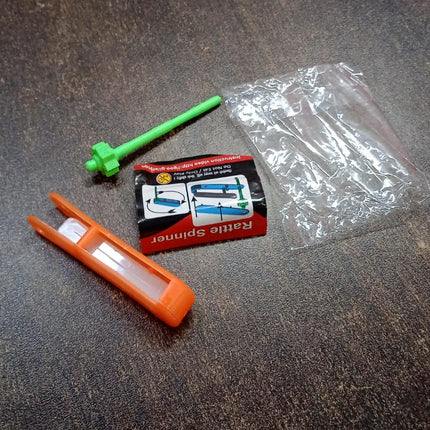 Small Colourful Non-Toxic Plastic Rattle Spinner Toys for Babies, Kids (1 Pc / Mix Color & Design)