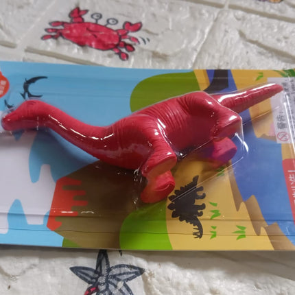 Red dinosaur shaped eraser