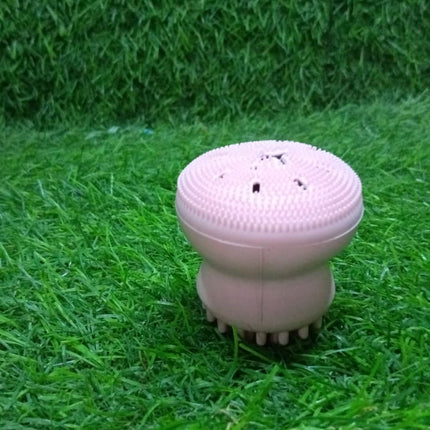 Facial cleansing brush with octopus design, made from silicone for gentle exfoliation.