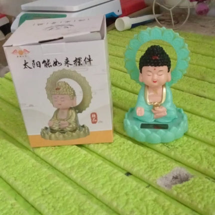 Plastic Solar Powered Moving Head Sitting Action Buddha Statue (1 Pc / Mix Color)