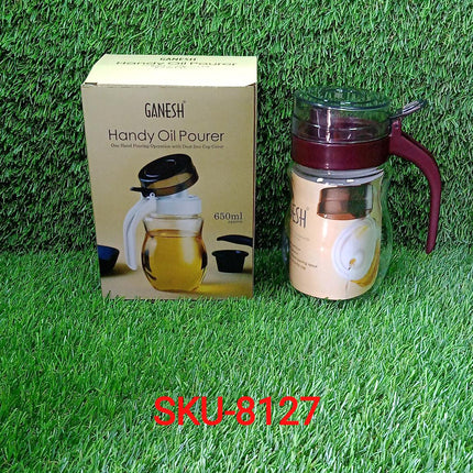 Small nozzle stainless steel oil container.
