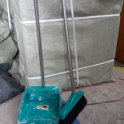 Dustpan and brush with long handles, perfect for sweeping and cleaning large areas.
