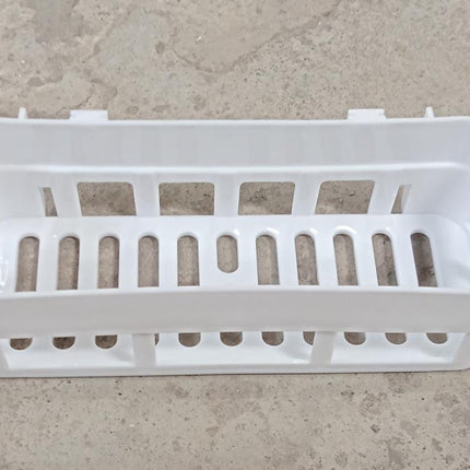 Plastic shower corner caddy with wall suction cup