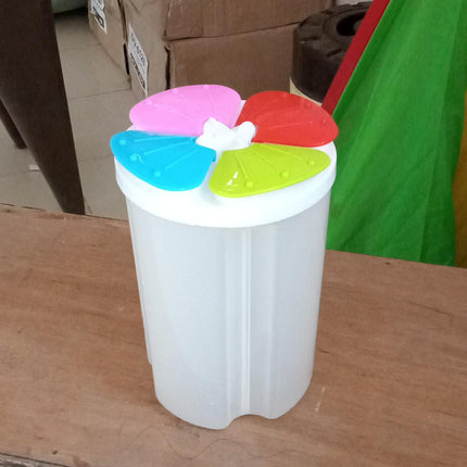 Transparent 4-section storage container for kitchen organization and food storage.