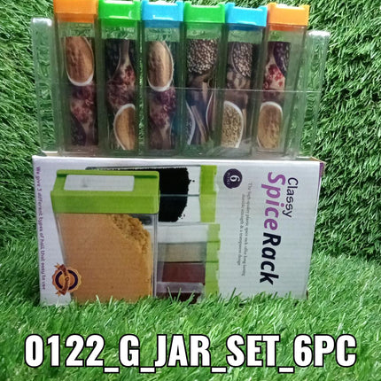 Assorted plastic spice jars with bright, colorful lids